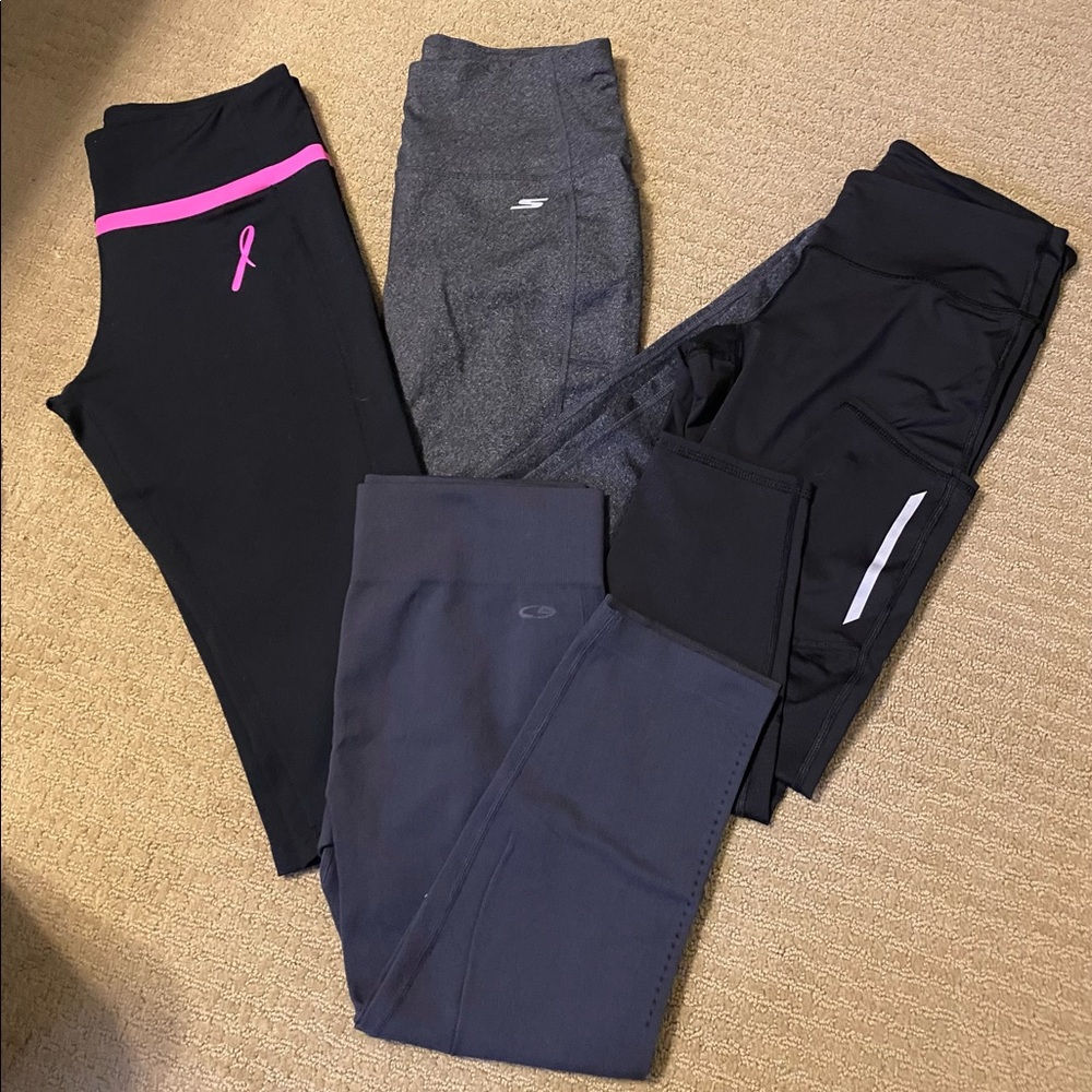 Womens Medium legging set of 4. Sketchers, Champion, Old Navy, and Reebook.